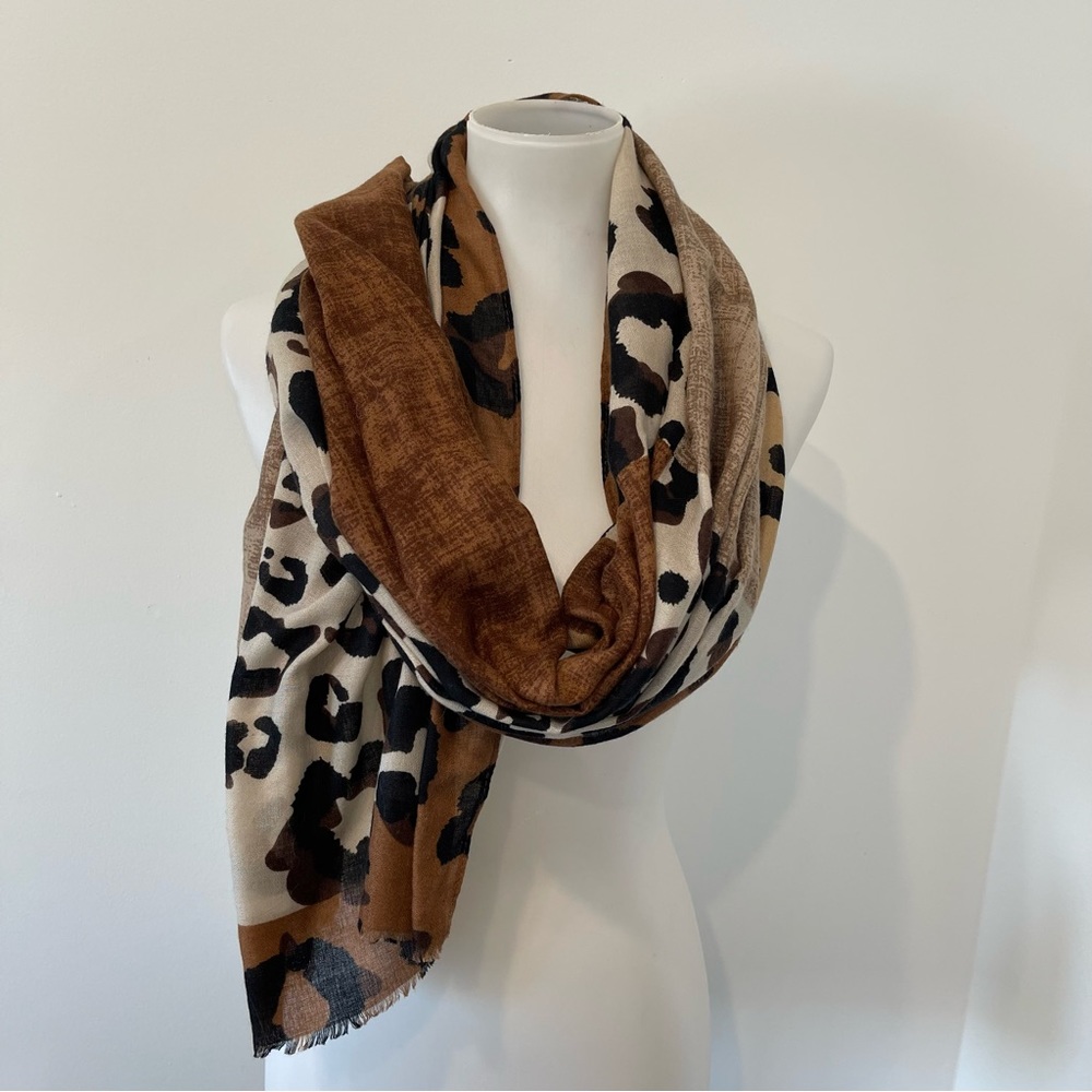 Lightweight brown and black animal print scarf.